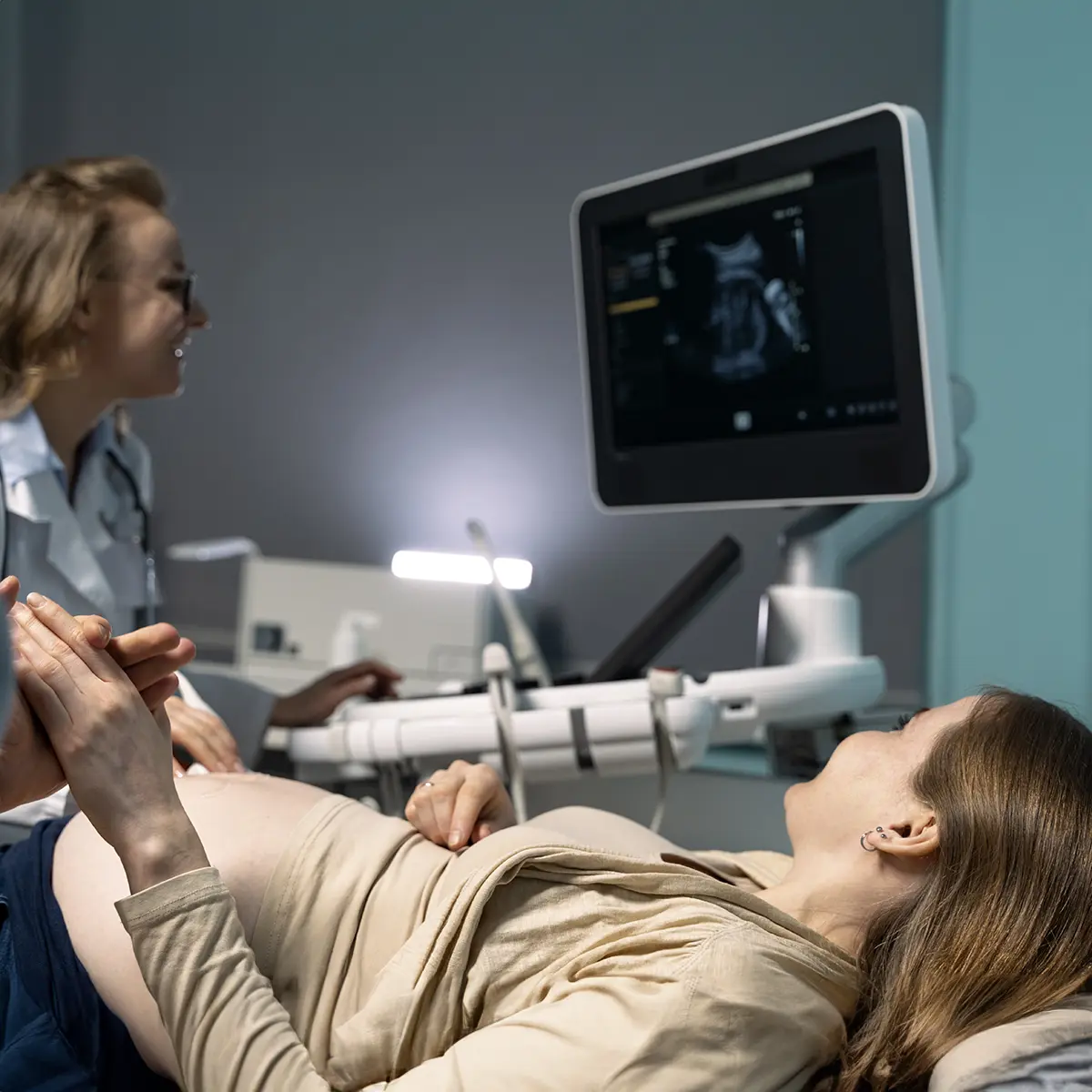 A Woman Seeing Her Baby’s Sonogram In The Hospital Room