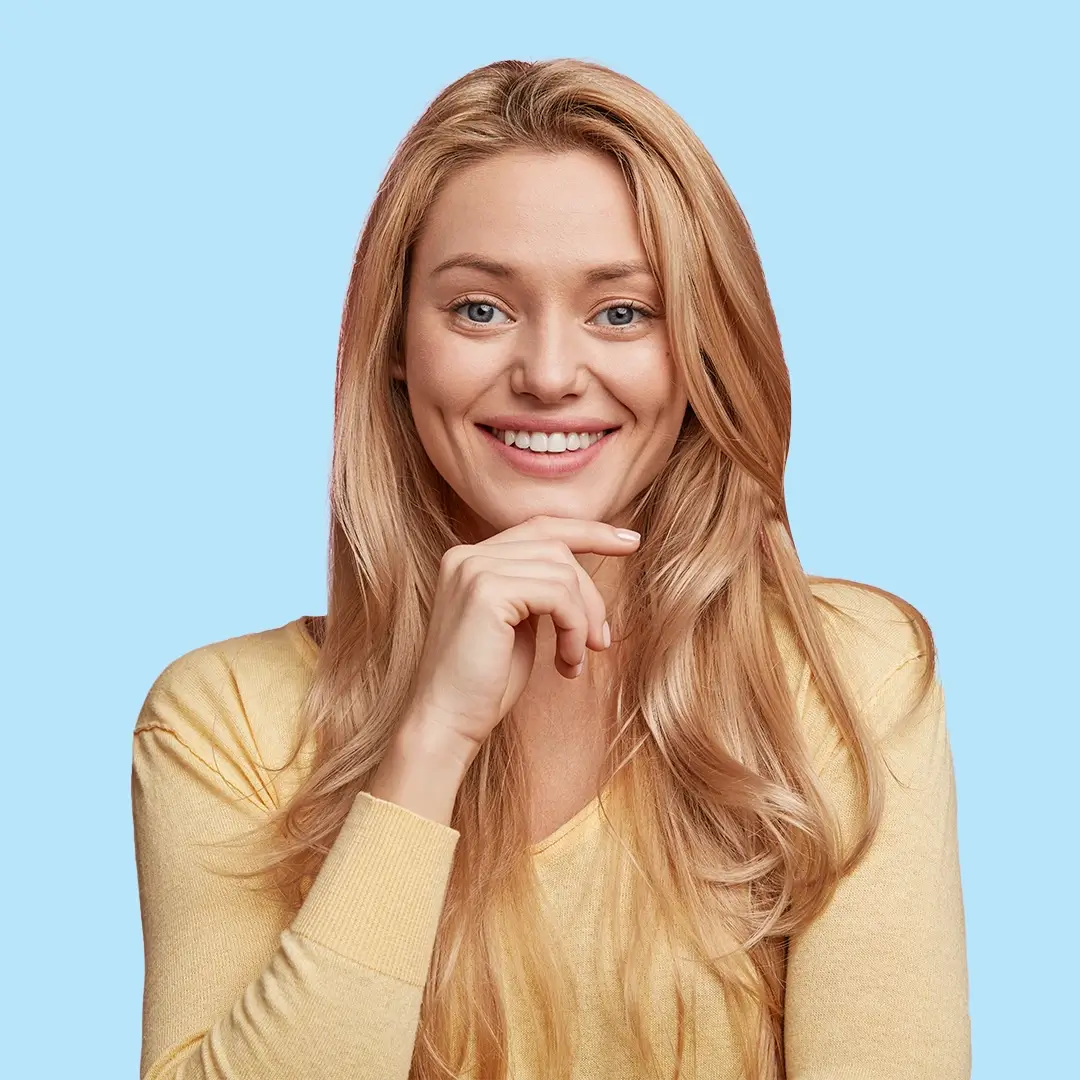 An Image Of A Blonde Young Woman Smiling