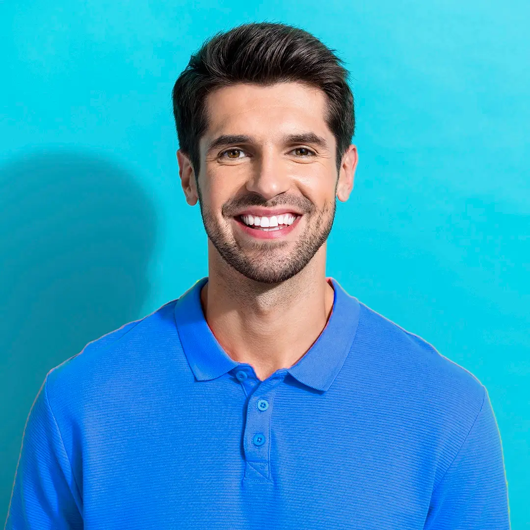 An Image Of A Portrait Of A Male Adult Smiling With His Teeth Seen